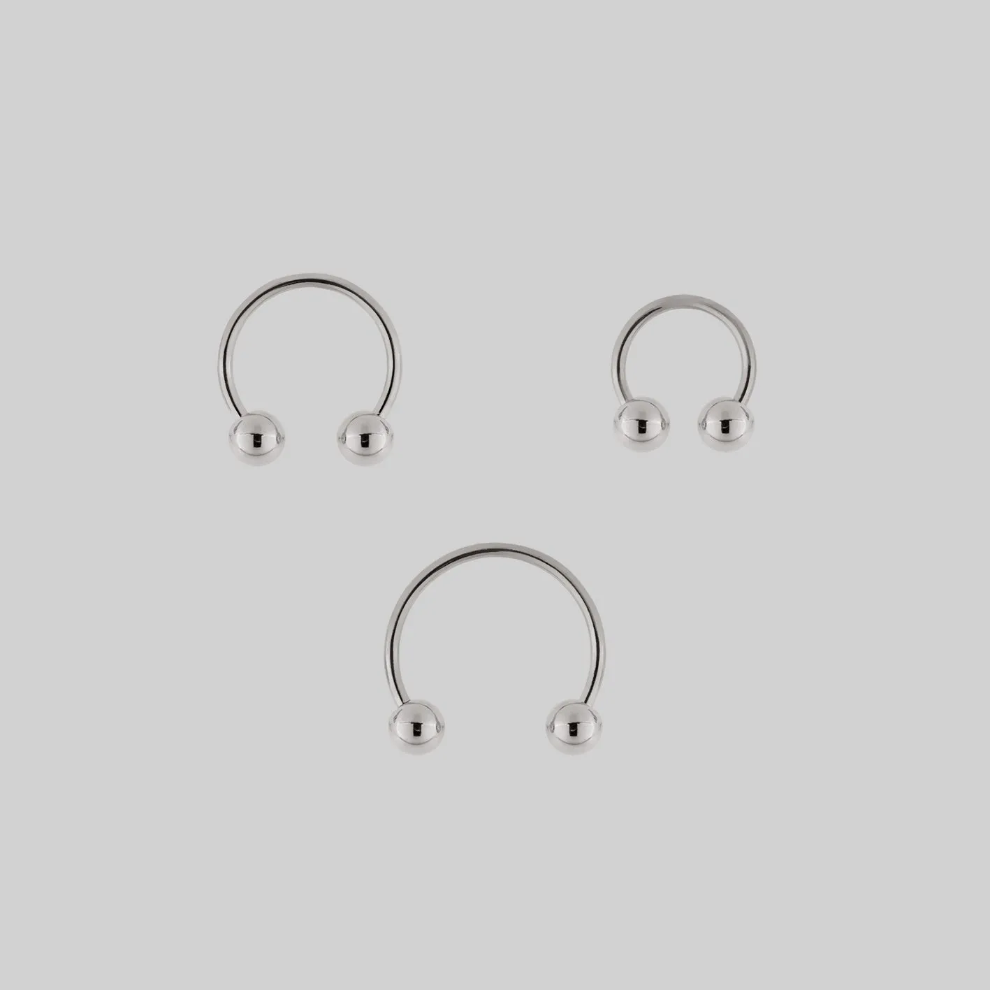 CLEO. Circular Barbell Ring - Silver